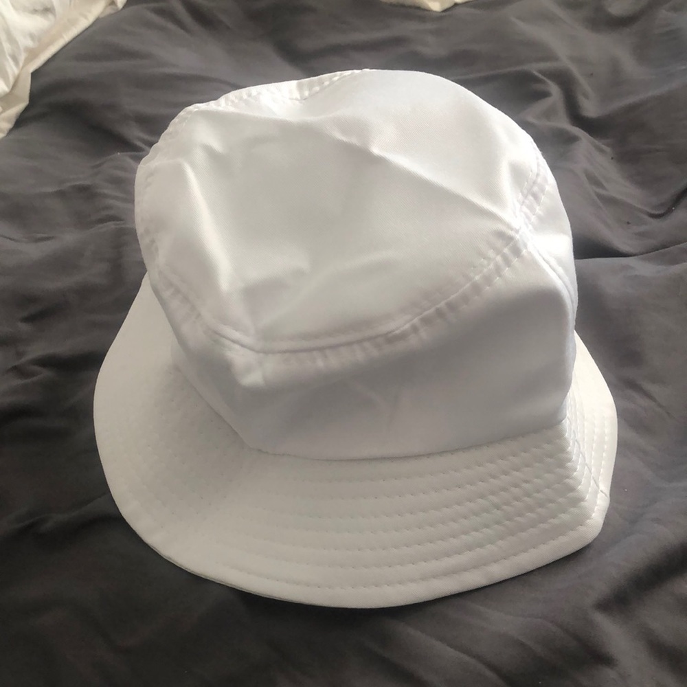 White bucket hat. Never worn